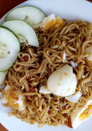 A picture of Indomie with boiled Eggs.