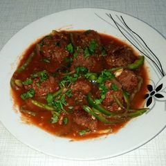 A picture of Spicy Meatballs in tomato sauce.