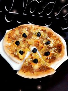 صورة لوصفة بيتزا بصوص الشكشوكة