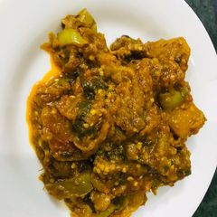 A picture of White Brinjal with potatoes.
