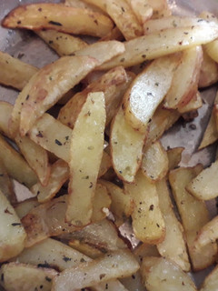 Una foto de Papas fritas con orégano