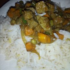 A picture of Rice and liver veggie sauce.