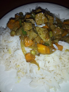 A picture of Rice and liver veggie sauce.