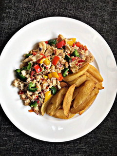 A picture of Scrambled Eggs with Irish Potatoes Fries.