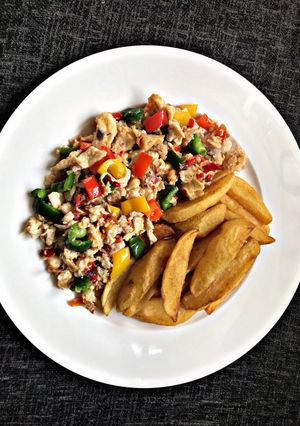 A picture of Scrambled Eggs with Irish Potatoes Fries.