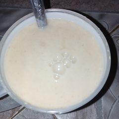 A picture of Kunun Alkama and milk.