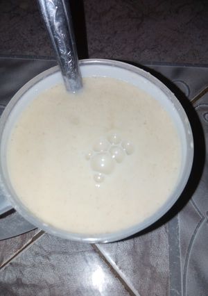 A picture of Kunun Alkama and milk.