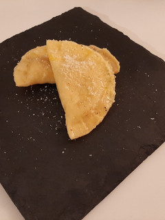 Una foto de Agnolotti con zapallo y queso azul