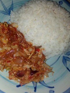 A picture of Rice with cabbage sauce.