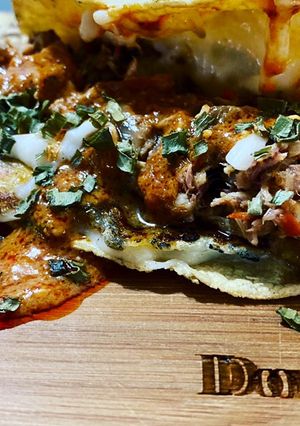 Una foto de Tacos de machaca de pescado ahumado y queso