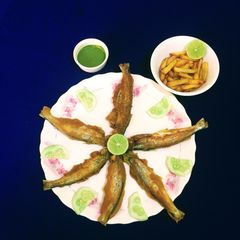A picture of Fish Fry with Potato Fries.
