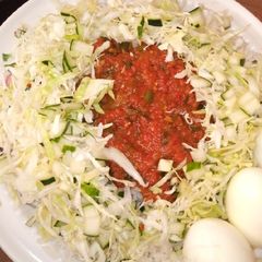 A picture of Rice with spring onion stew.