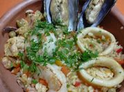 Una foto de calamar con langostino