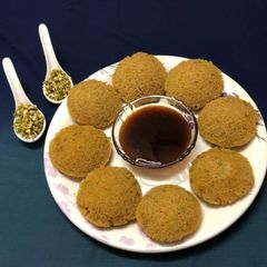 A picture of Oats Idli Stuffed with Sprouts Moong.