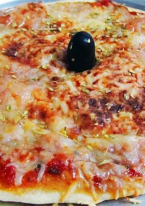 A picture of Home Made Pizza.