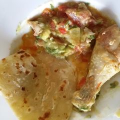 A picture of Chicken chapati with Kachumbari.