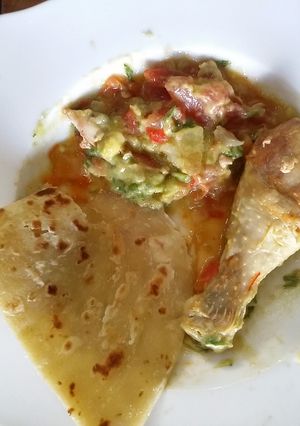 A picture of Chicken chapati with Kachumbari.