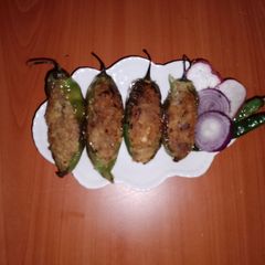 A picture of Potato stuffed jalapeno peppers🧅🥭🌿.