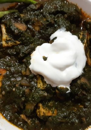 A picture of Creamy Mushroom Palak Paneer.