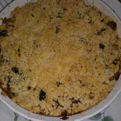 Una foto de Crumble de manzana🍏 en tarta re fácil🍎