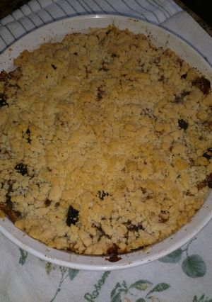 Una foto de Crumble de manzana🍏 en tarta re fácil🍎
