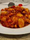 Ñoquis con boloñesa de pulpo