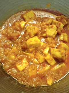 A picture of Paneer with Tomato Gravy.