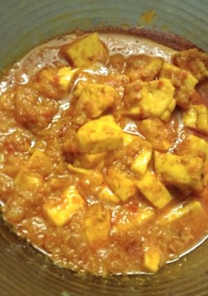 A picture of Paneer with Tomato Gravy.