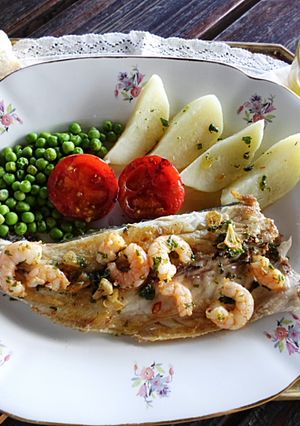 Foto principal de Lubina Salvaje con Gambas al Ajillo