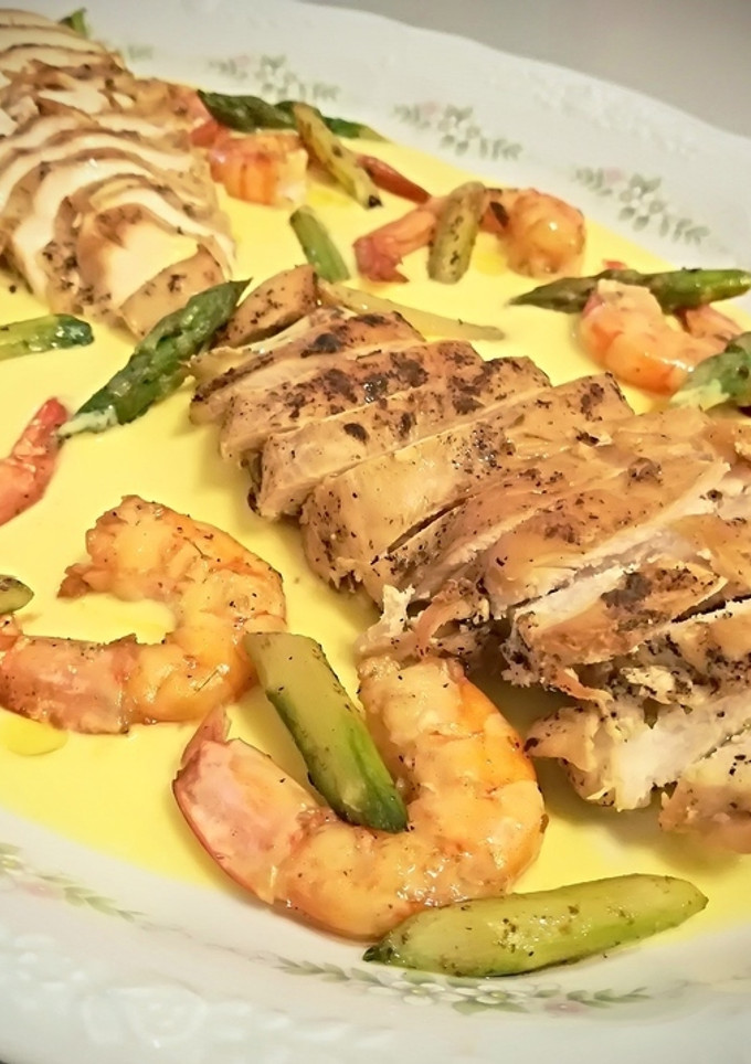 Una foto de Pechuga de pollo en crema de mango
