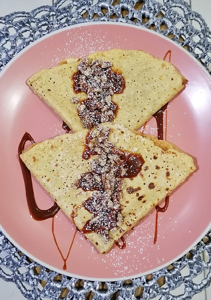 Una foto de Crepas de avena con cajeta y nuez 🤩