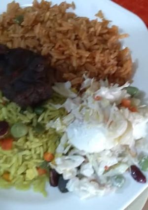 A picture of Mixed Rice and coleslaw.