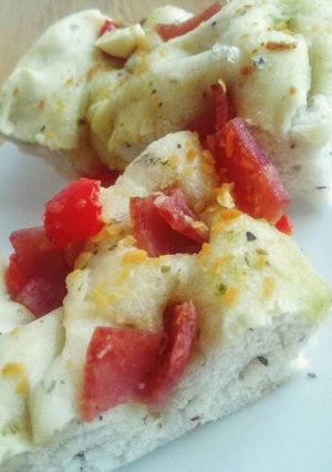 A picture of Focassia- ham and basil.