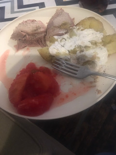 A picture of Pork roast with cinnamon apples.