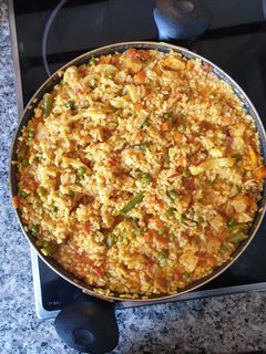 Una foto de Arroz 'apaellado' de pulpo y chopitos