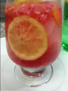 A picture of Sparkling Raspberry lemonade|| preserved raspberry lemonade.
