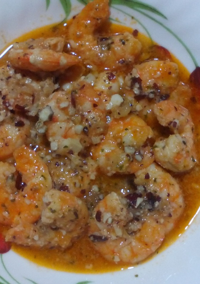 Una foto de Langostinos al whisky