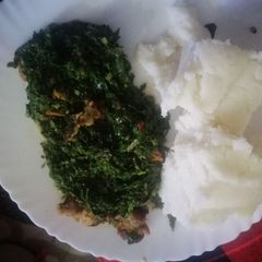 A picture of Sukuma wiki(kales) and beef.