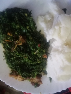 A picture of Sukuma wiki(kales) and beef.