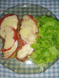 Una foto de Milanesas de berenjena a la napolitana