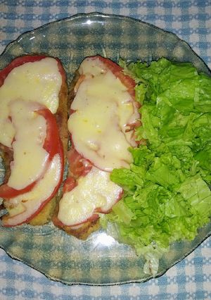 Una foto de Milanesas de berenjena a la napolitana