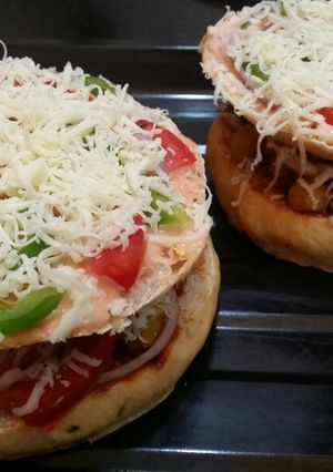 A picture of Double decker Chole Pizza.
