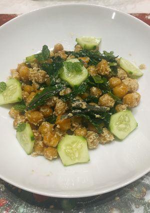 A picture of Chickpea Salad with Greens and Tahini Sauce.