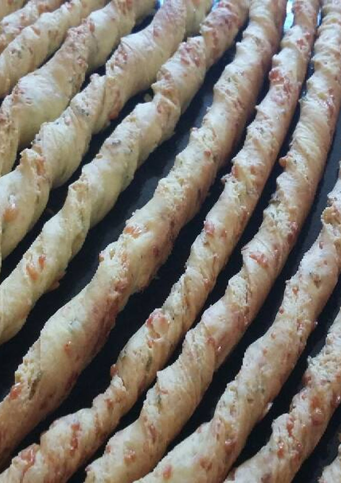 Una foto de Palitos de queso y orégano 👌