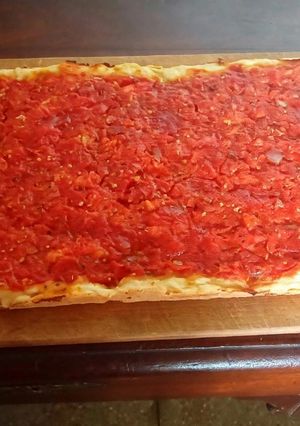 Una foto de Pizza estilo familiar