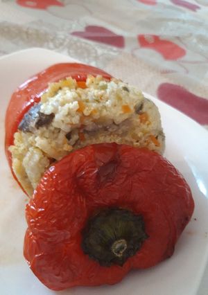 A picture of Bell Peppers Stuffed with Millet and Mushrooms.