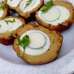 A picture of Potato scotch eggs.