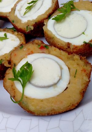 A picture of Potato scotch eggs.