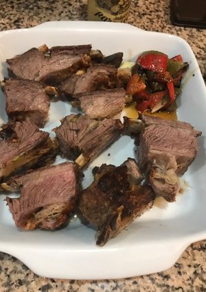 Una foto de Asado al horno de barro con papas asadas