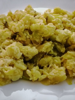 Una foto de Zucchini (zapallo o calabacín) con quesitos